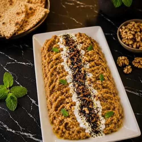 تصویر مرتبط با دستور تهیه بورانی بادمجان با طعم دودی و سیر؛ پیش‌غذای ساده و خوشمزه