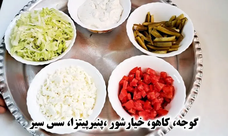 تصویر مرتبط با طرز تهیه رپ مرغ خانگی با نان تورتیلا؛ شام سریع و کمهزینه