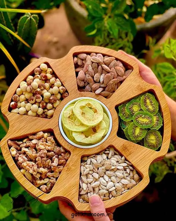 تصویر مرتبط با ایدههای خلاقانه برای تزیین آجیل شب یلدا با طرحهای شیک و متنوع
