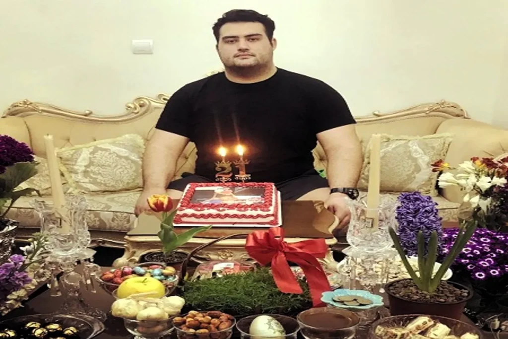 عکس علی داودی در مسابقات وزنه‌برداری