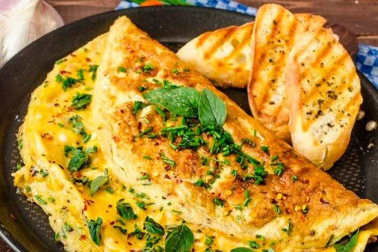 تصویر مرتبط با طرز تهیه املت بدون تخم مرغ با آرد نخودچی؛ صبحانه‌ای گیاهی و خوش‌طعم