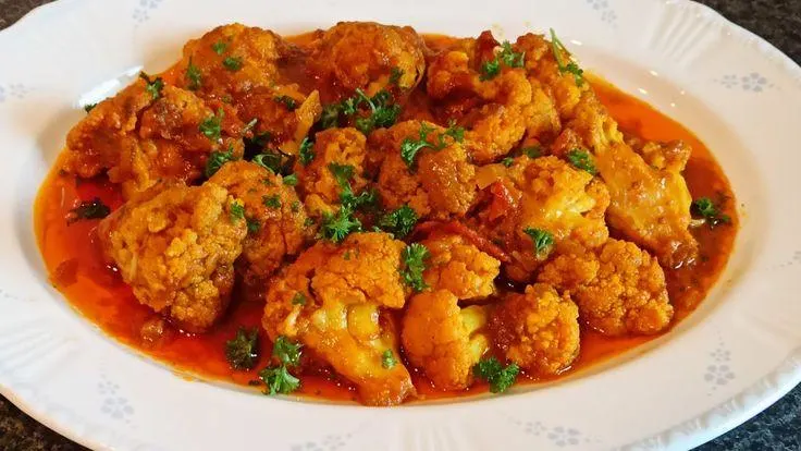 تصویر مرتبط با دستور پخت خورش گل کلم شمالی با طعم رب انار و سبزیهای معطر