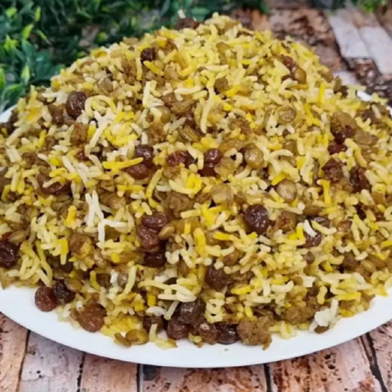 تفت دادن پیاز و گوشت چرخکرده با کره